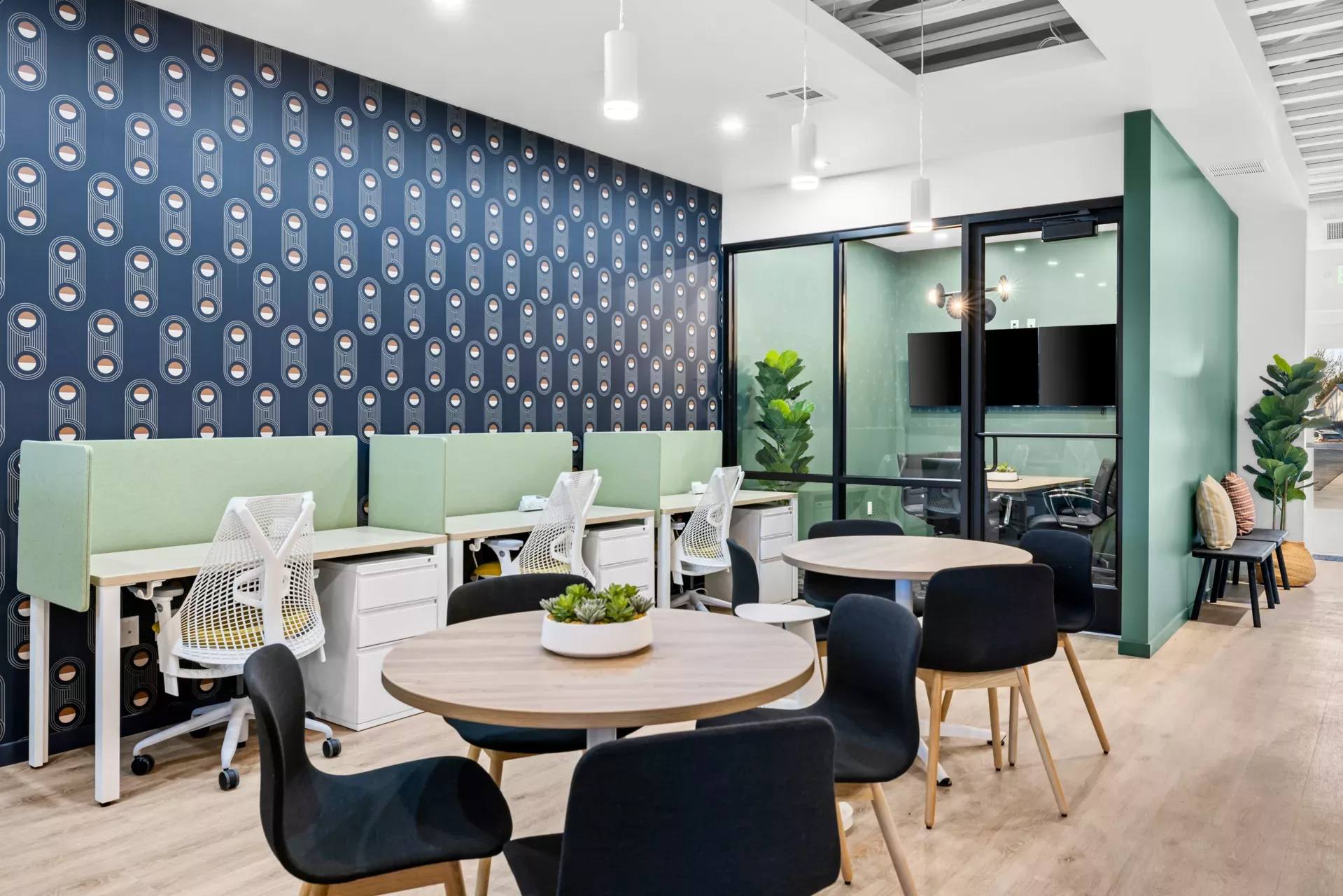Open coworking office space with desks and chairs