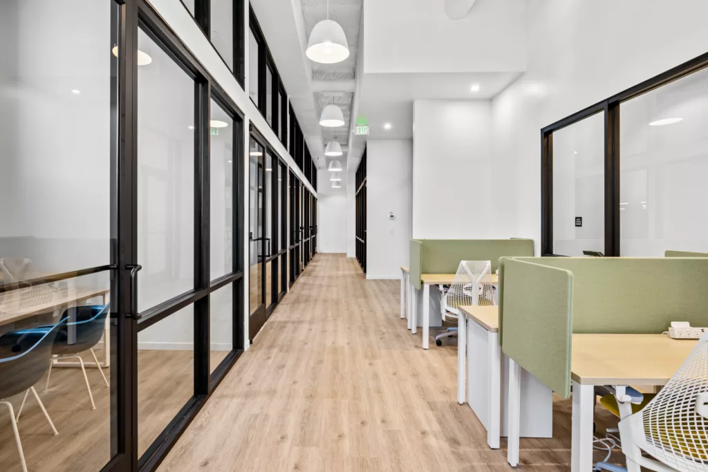 Open coworking office space with high ceilings
